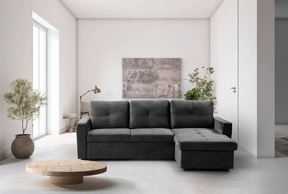 Sofá cama Pau negro con chaise longue en un salón luminoso