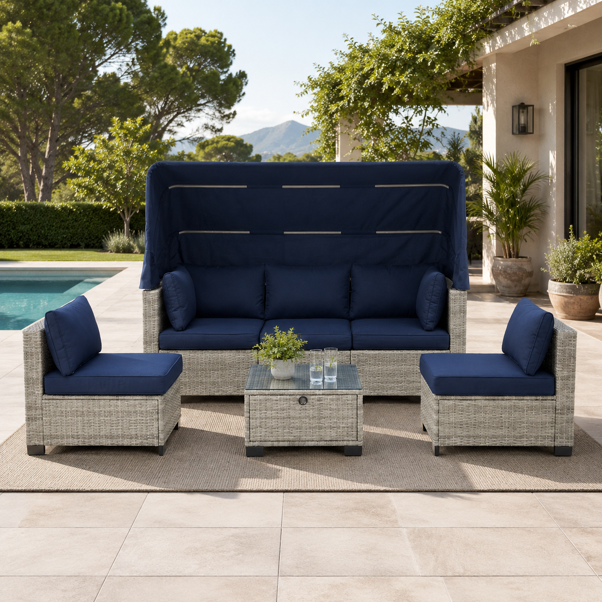Conjunto de jardín Erommy en ratán gris con cojines azules, sofá con dosel, dos sillones y mesa