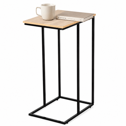 Mesa auxiliar en C con taza y libro sobre el tablero